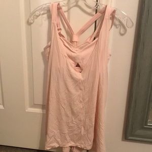 Pale pink Lululemon workout top